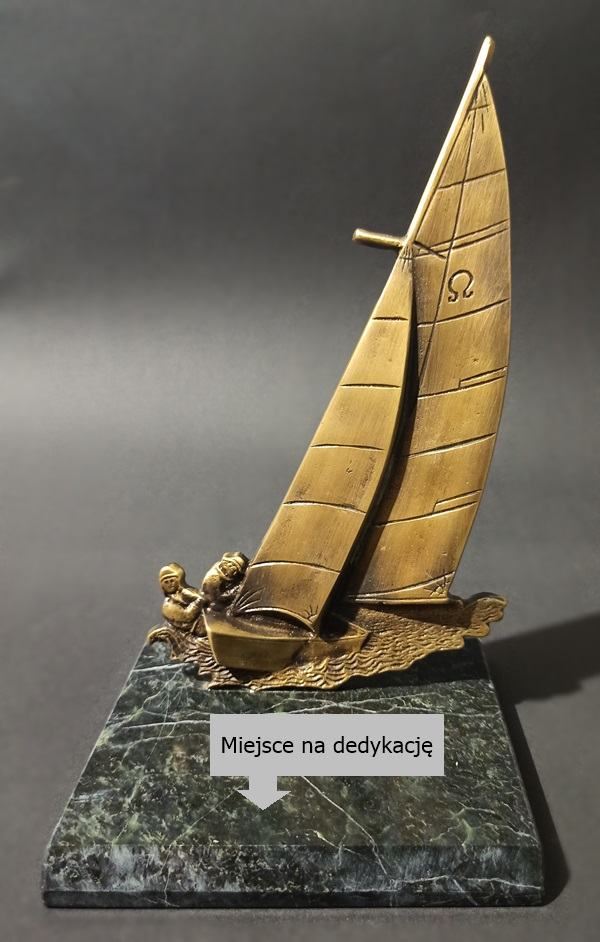 Sprzedam_mosiężna figurkę Jacht omega na prezent