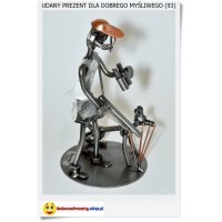 Metalowa figurka myśliwy