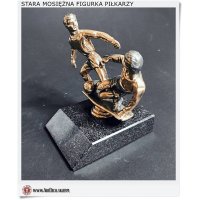 Mosiężna statuetka na podstawie 